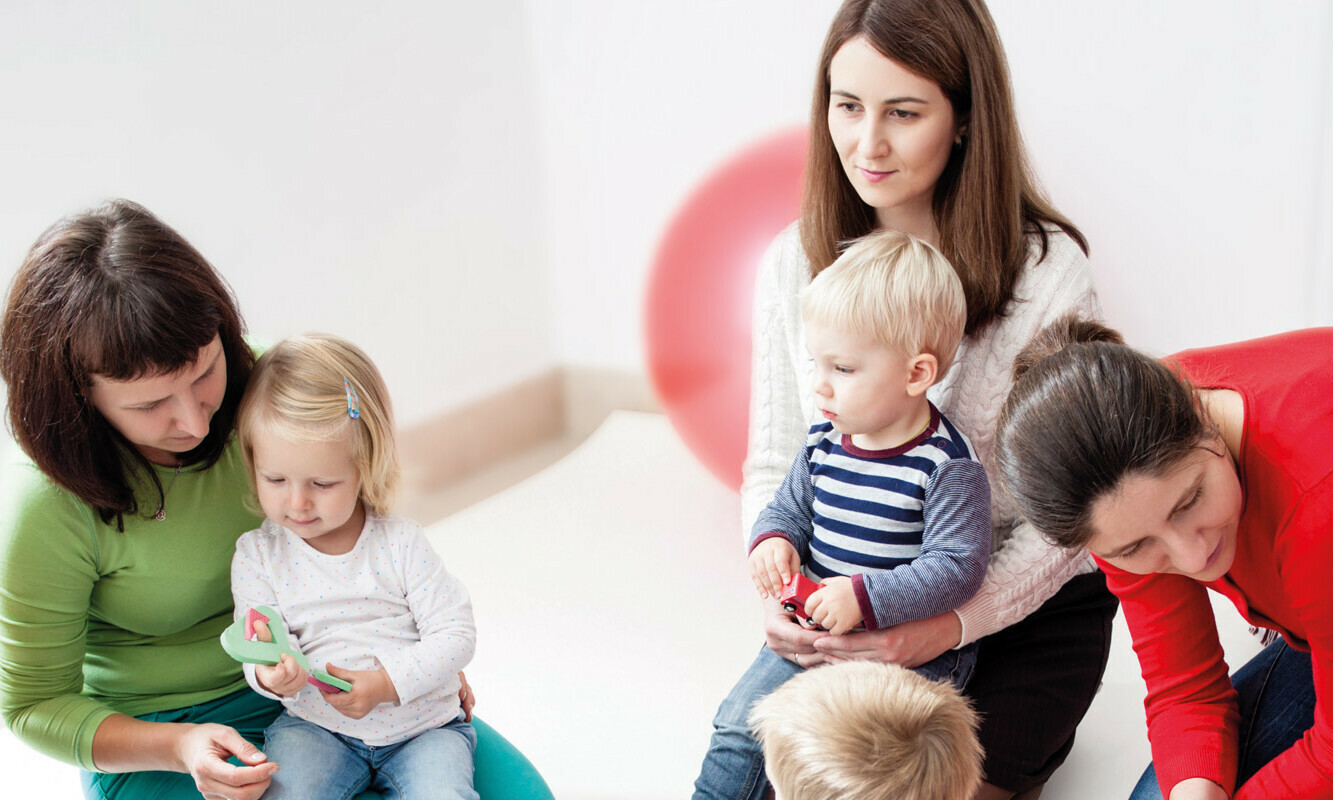 Young moms with their kids