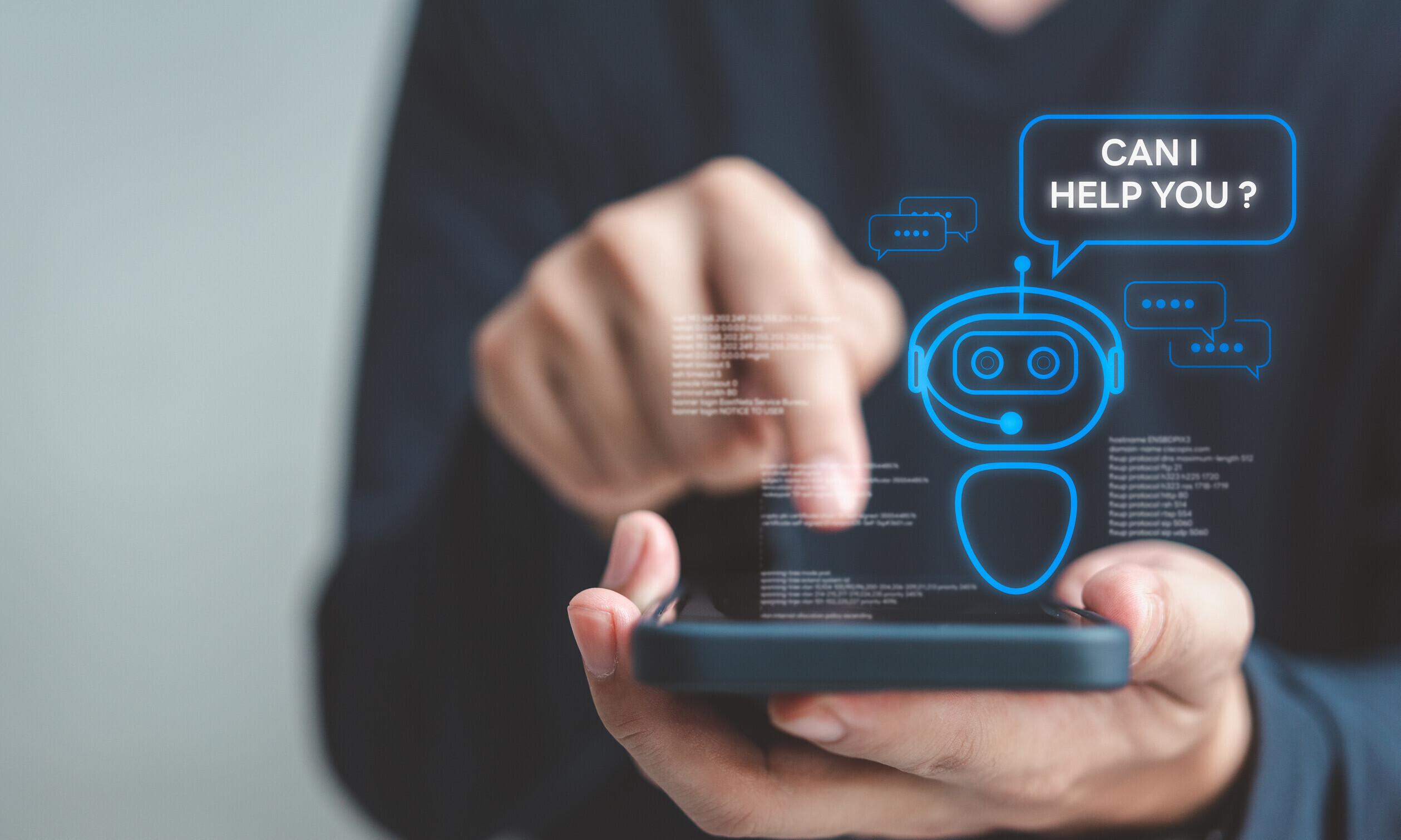 Eine Person tippt auf dem Handy und ein Chatbot in Form einer KI erscheint