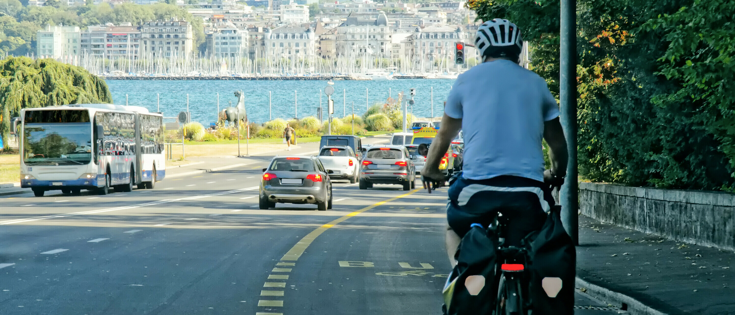 Man on bicycle on the road in Geneva, Switzerland.